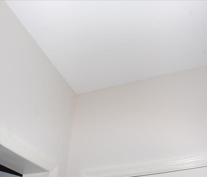 corner of a room with white walls and ceiling