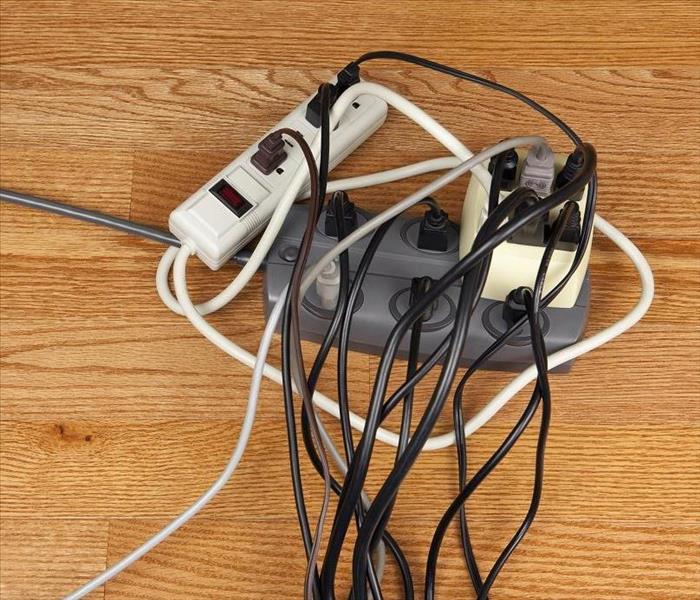 several cords plugged into a power strip