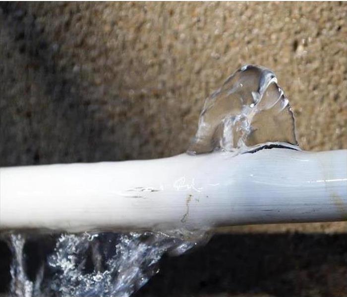 white Pipe bursting with water